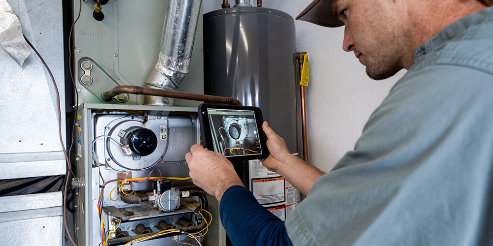 Tech uses furnace safety tips to service heating system.